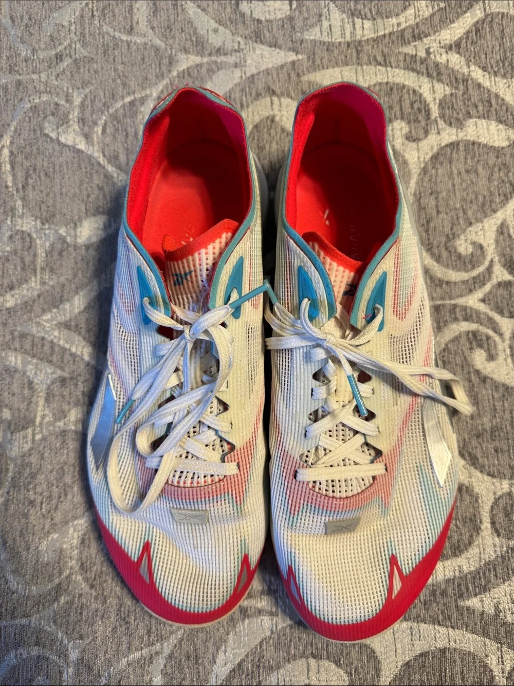 Reebok Nano Froning X2 Men’s White Athletic Sneakers with Red and Blue Accents